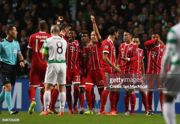 Bayern players celebrate Kingsley Coman's opening goal during the UEFA Champions League group B match between Celtic FC and Bayern Muenchen at Celtic...