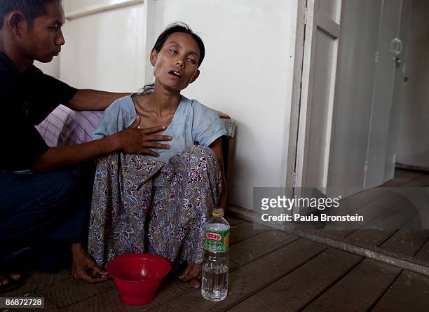 Ma Khin Lay suffering from severe pains after not being treated properly at the general hospital and later transferred to an AIDS hospital with low...