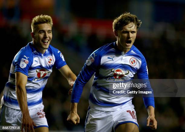 John Swift of Reading celebrates with Sam Smith after scoring the opening goal during the Sky Bet Championship match between Reading and Nottingham...