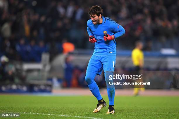Alisson Becker of AS Roma celebrates after Stephan El Shaarawy of AS Roma scored his sides second goal during the UEFA Champions League group C match...