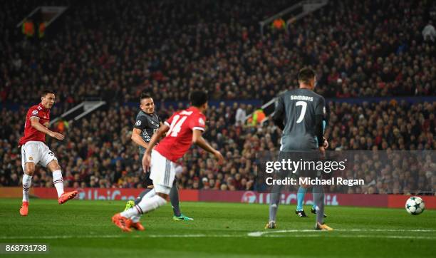 Nemanja Matic of Manchester United takes a shot leading to an own goal by Mile Svilar of Benfica during the UEFA Champions League group A match...