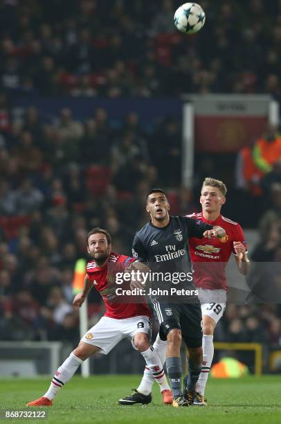 Juan Mata of Manchester United in action with Raul Jimenez of Benfica during the UEFA Champions League group A match between Manchester United and SL...