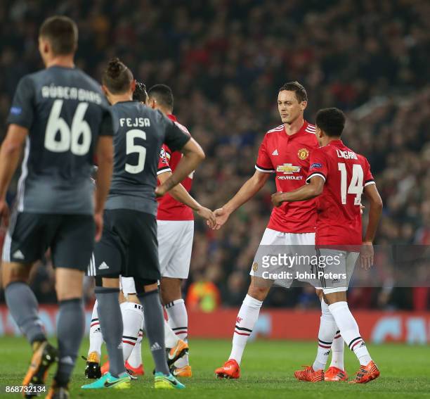Nemanja Matic of Manchester United celebrates his part in Mile Svilar of Benfica scoring an own goal during the UEFA Champions League group A match...