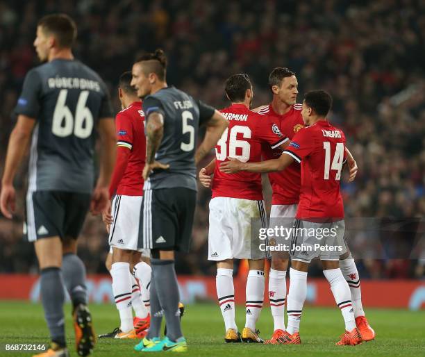 Nemanja Matic of Manchester United celebrates his part in Mile Svilar of Benfica scoring an own goal during the UEFA Champions League group A match...