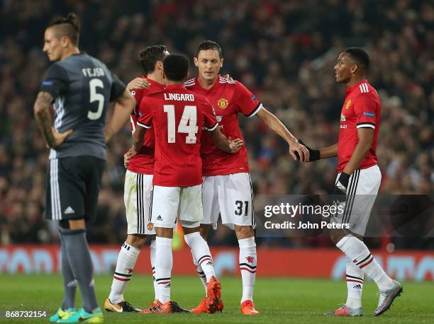 Nemanja Matic of Manchester United celebrates his part in Mile Svilar of Benfica scoring an own goal during the UEFA Champions League group A match...