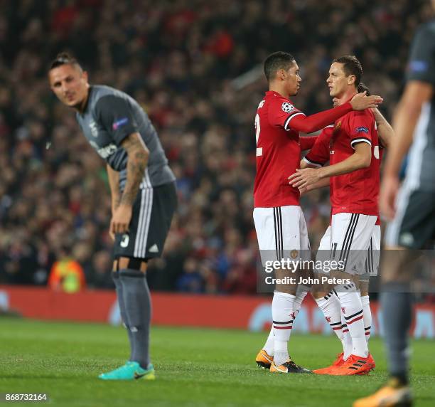 Nemanja Matic of Manchester United celebrates his part in Mile Svilar of Benfica scoring an own goal during the UEFA Champions League group A match...