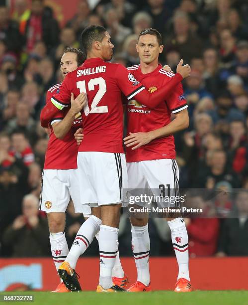 Nemanja Matic of Manchester United celebrates his part in Mile Svilar of Benfica scoring an own goal during the UEFA Champions League group A match...