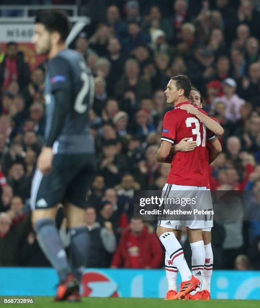 Nemanja Matic of Manchester United celebrates his part in Mile Svilar of Benfica scoring an own goal during the UEFA Champions League group A match...