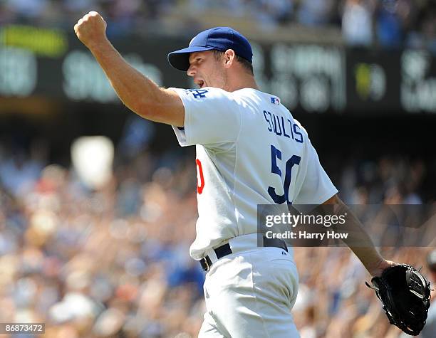 Eric Stults of the Los Angeles Dodgers celebrates his four hit shutout of the San Francisco Giants for a 8-0 win at Dodger Stadium on May 9, 2009 in...