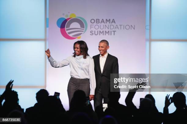 Former first Lady Michelle and former president Barack Obama are introduced at the inaugural Obama Foundation Summit on October 31, 2017 in Chicago,...