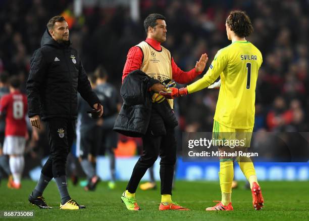 Julio Cesar consoles Mile Svilar of Benfica following his own goal during the UEFA Champions League group A match between Manchester United and SL...