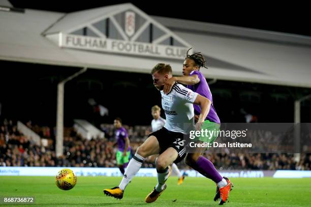 Tomas Kalas of Fulham holds off Bobby Reid of Bristol City during the Sky Bet Championship match between Fulham and Bristol City at Craven Cottage on...