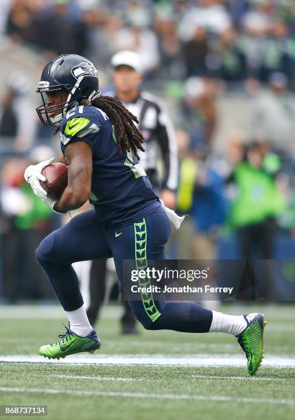 Eddie Lacy of the Seattle Seahawks runs the ball against the Houston Texans at CenturyLink Field on October 29, 2017 in Seattle, Washington.