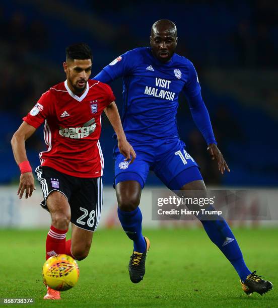 Kevin Bru of Ipswich Town is tackled by Souleymane Bamba of Cardiff City during the Sky Bet Championship match between Cardiff City and Ipswich Town...