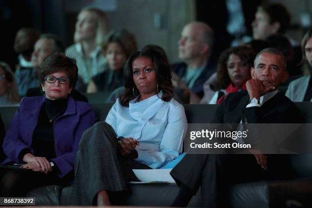 Former advisor to the president Valerie Jarrett and former first Lady Michelle and president Barack Obama listen to speakers at the inaugural Obama...