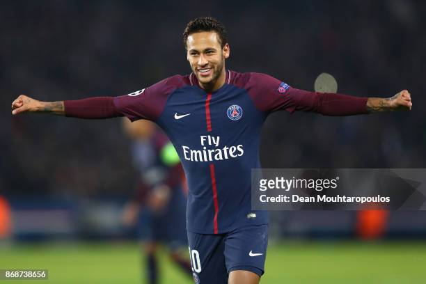Neymar of PSG celebrates after his free kick leads to the goal scored by Layvin Kurzawa of PSG during the UEFA Champions League group B match between...