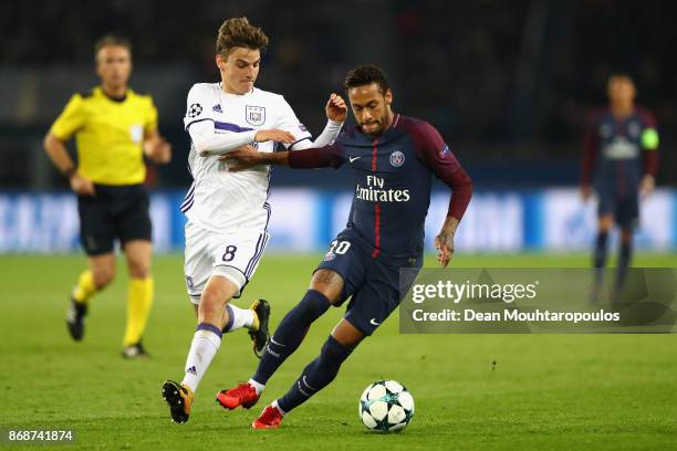 Pieter Gerkens of RSC Anderlecht and Neymar of PSG in action during the UEFA Champions League group B match between Paris Saint-Germain and RSC...