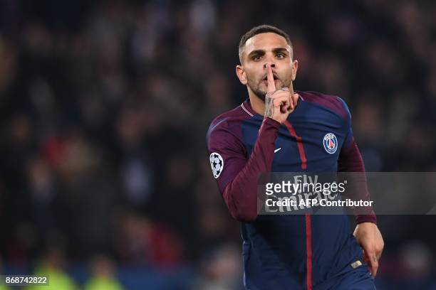 Paris Saint-Germain's French defender Layvin Kurzawa celebrates after scoring a goal during the UEFA Champions League Group B football match between...