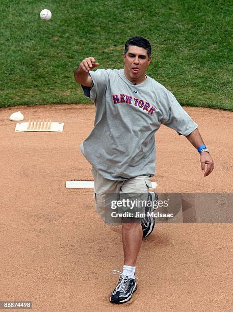 Radio personality Gary Dell'Abate throws out the first pitch prior to the New York Mets playing against the Pittsburgh Pirates on May 9, 2009 at Citi...