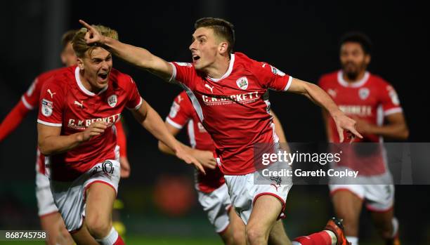 Joe Williams of Barnsley celebrates scoring his team's third goal during the Sky Bet Championship match between Burton Albion and Barnsley at Pirelli...