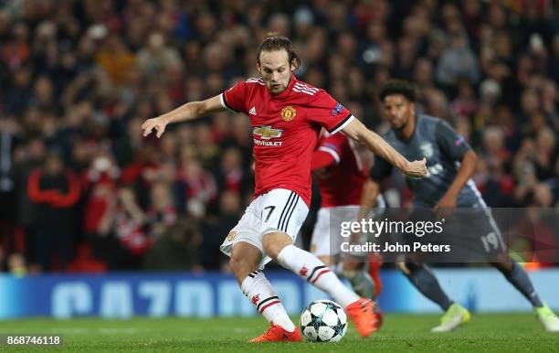 Daley Blind of Manchester United scores their second goal during the UEFA Champions League group A match between Manchester United and SL Benfica at...