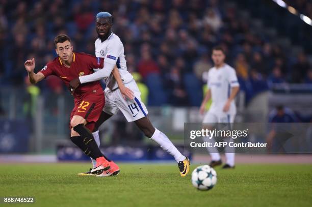 Chelsea's French midfielder Tiemoue Bakayoko fights for the ball with Roma's Italian striker Stephan El Shaarawy during the UEFA Champions League...
