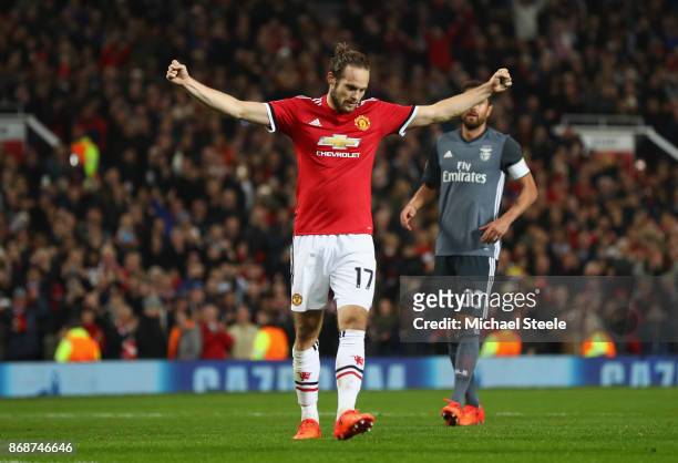 Daley Blind of Manchester United celebrates scoring a penalty, his side's second goal during the UEFA Champions League group A match between...