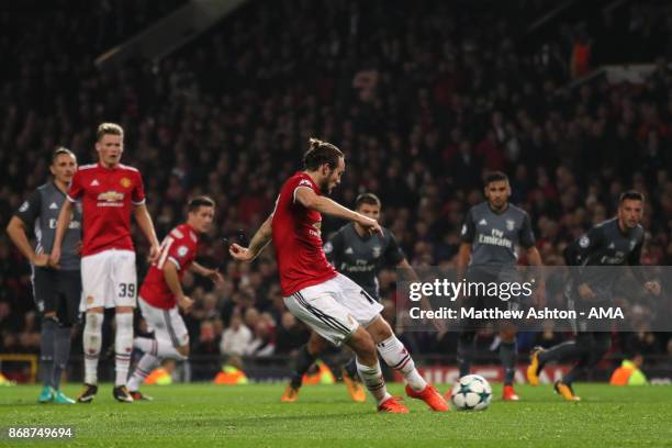 Daley Blind of Manchester United scores a goal to make the score 2-0 during the UEFA Champions League group A match between Manchester United and SL...