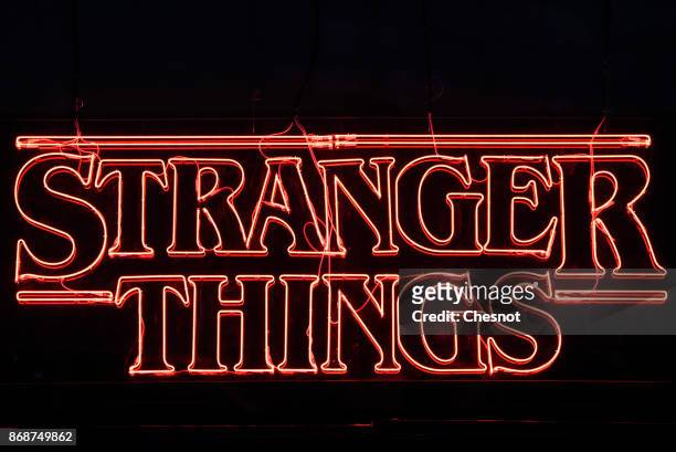 Television series logo "Stranger Things" is displayed during the 'Paris Games Week' on October 31, 2017 in Paris, France. 'Paris Games Week' is an...