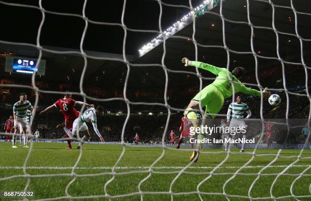 Javi Martínez of Bayern Munich scores his team's second goal during the UEFA Champions League group B match between Celtic FC and Bayern Muenchen at...