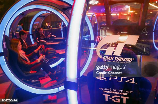 Visitor plays the video game "Gran Turismo Sport" developed by Polyphony Digital and published by Sony Interactive Entertainment on Sony PlayStation...