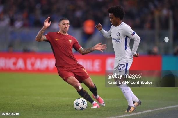 Roma's Croatian defender Aleksandar Kolarov vies with Chelsea's Brazilian midfielder Willian during the UEFA Champions League football match AS Roma...