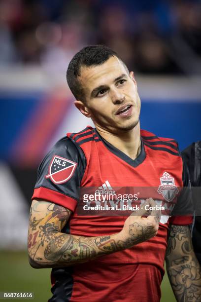 Sebastian Giovinco of Toronto FC reacts to a foul during the Audi MLS Cup Playoff match between New York Red Bulls and Toronto FC at Red Bull Arena...