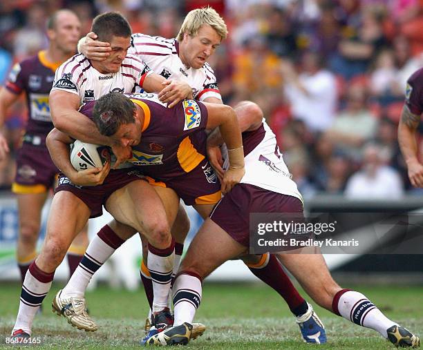 Ashton Sims of the Broncos attempts to break through the Sea Eagles defence during the round nine NRL match between the Brisbane Broncos and the...