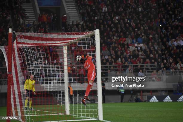 Olympiakos' Belgian goalkeeper Silvio Proto reacts during the UEFA Champions League group D football match between FC Barcelona and Olympiakos FC at...