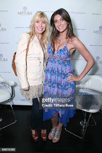 Lisa and Brittany Gastineau attend the "On The Go Beauty" Event at the Gavert Atelier on May 9, 2009 in Beverly Hills, California.