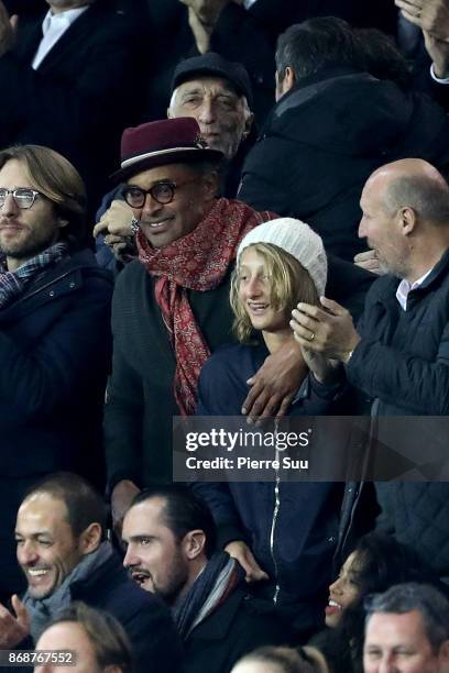 Yannick Noah and his son Joalukas are seen in the stands during the UEFA Champions League group B match between Paris Saint-Germain and RSC...