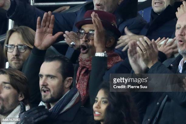 Yannick Noah and his son Joalukas are seen in the stands during the UEFA Champions League group B match between Paris Saint-Germain and RSC...