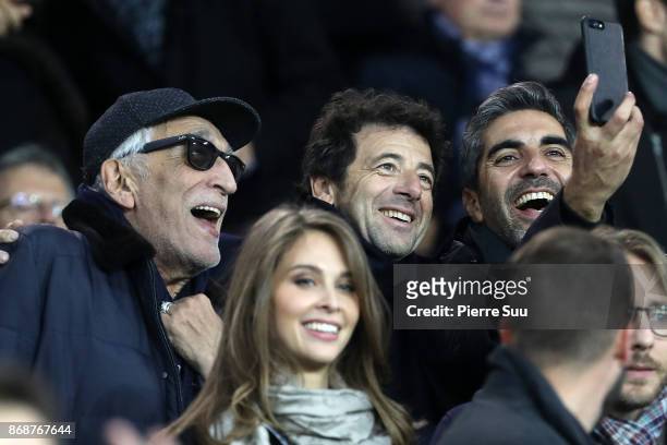 Gerard Darmon,Patrick Bruel and Ary Abittan are seen in the stands during the UEFA Champions League group B match between Paris Saint-Germain and RSC...