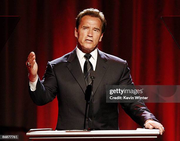 California Governor Arnold Schwarzenegger appears onstage at the "Noche de Ninos Gala" benefiting Childrens Hospital of Los Angeles at the Beverly...