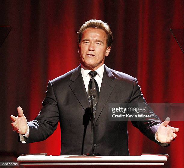 California Governor Arnold Schwarzenegger appears onstage at the "Noche de Ninos Gala" benefiting Childrens Hospital of Los Angeles at the Beverly...