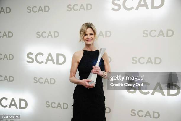 Actress Kyra Sedgwick poses with Spotlight Award backstage at Trustees Theater during 20th Anniversary SCAD Savannah Film Festival on October 31,...