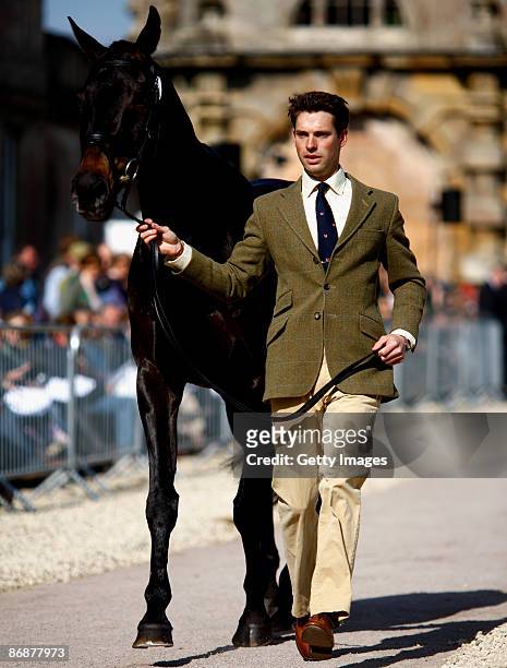 Harry Meade of Great Britain in action during the horse inspection before the show jumping at The Mitsubishi Motors Badminton Horse Trials in the...