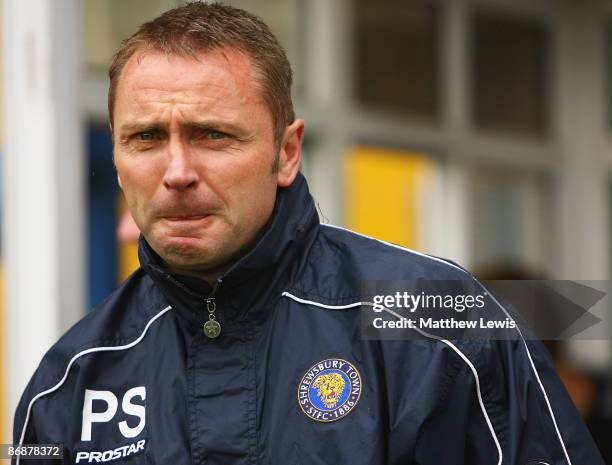 Paul Simpson, manager of Shrewsbury Town, looks on during the Coca-Cola Football League Two match between Bury and Shrewsbury Town at Gigg Lane on...