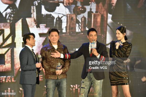 Actor Aaron Kwok, director Chung Siu-hung, actor Simon Yam and actress Zhang Lanxin attend the premiere of film "Eternal Wave" on October 31, 2017 in...