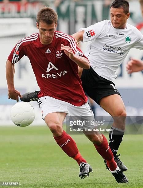 Stephan Schroeck of Fuerth and Christian Eigler of Nuernberg battle for the ball during the Second Bundesliga match between SpVgg Greuther Fuerth and...