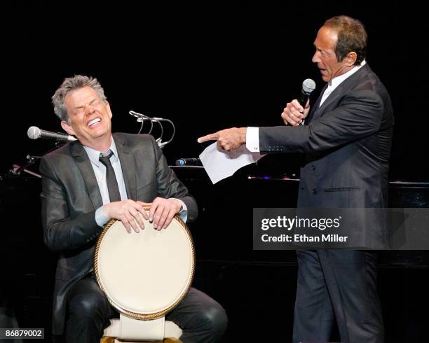 Producer/composer David Foster and singer Paul Anka perform during the "Hit Man: David Foster and Friends" concert at the Mandalay Bay Events Center...