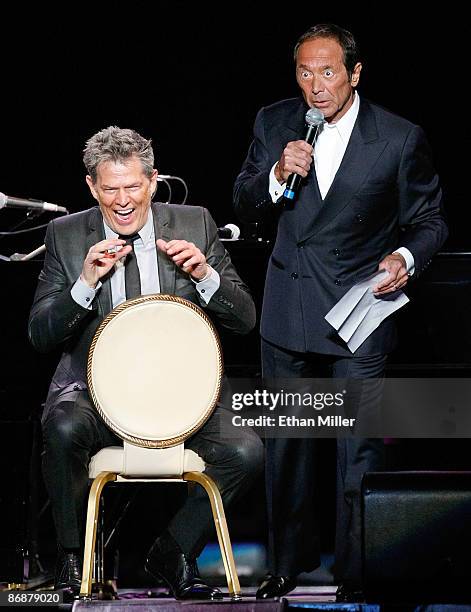 Producer/composer David Foster and singer Paul Anka perform during the "Hit Man: David Foster and Friends" concert at the Mandalay Bay Events Center...