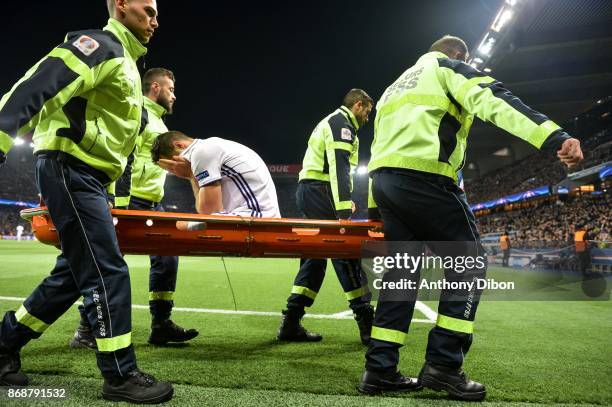 Uros Spajic of Anderlecht injured during the UEFA Champions League match between Paris Saint-Germain and RSC Anderlecht at Parc des Princes on...