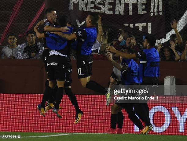 Alejandro Silva of Lanus celebrates with teammates after scoring the fourth goal of his team during a second leg match between Lanus and River Plate...